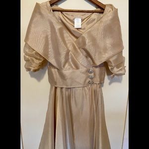 Rich Gold Tulle Flare Gown. Brand Name Watters